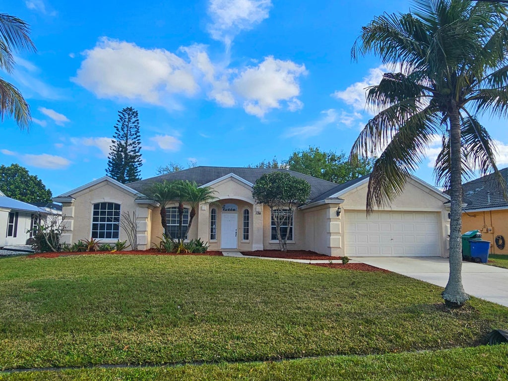 Photo of 126 NE Surfside Avenue, Port Saint Lucie, FL 34983 (MLS # R10968392)
