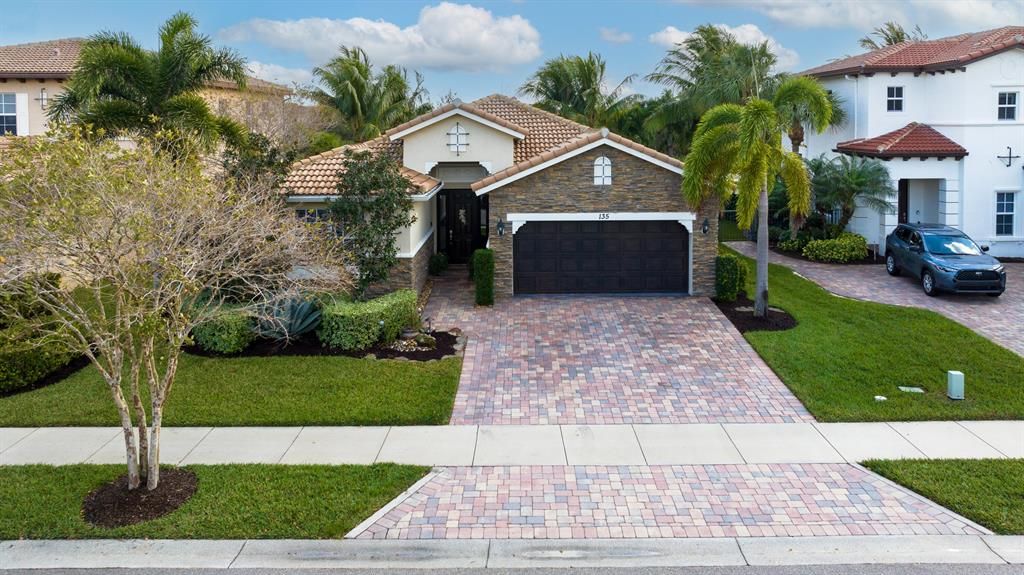 Photo of 135 Castle Island Place, Jupiter, FL 33458 (MLS # R10862058)