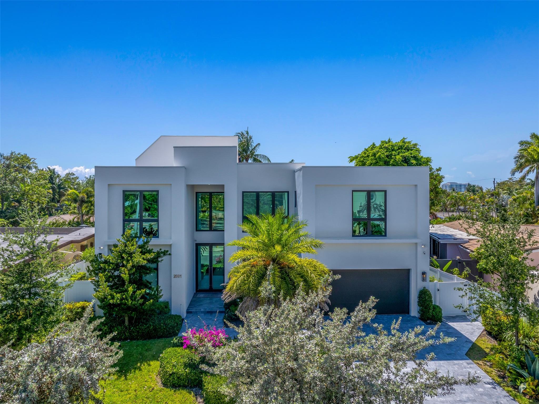 Brand-New Luxury Pool Home in Harbor Inlet! Be the first to live in this stunning 5-bed, 5.5-bath home with 5,611 sq ft under roof, built by PMG Construction. This modern residence features a chef’s kitchen, saltwater pool/spa, elevator, generator, and 2-car garage. Entertain in style with a spacious open floor plan that flows seamlessly to the outdoor living area. Relax or host guests on the private rooftop terrace with breathtaking panoramic views of Pier 66, the Fort Lauderdale port, and skyline. Located in Harbor Inlet—a quiet, gated enclave known for deep water access, walkability to the beach, and proximity to Port Everglades and downtown Fort Lauderdale. A rare opportunity for elegant coastal living. Available October 16, 2025.