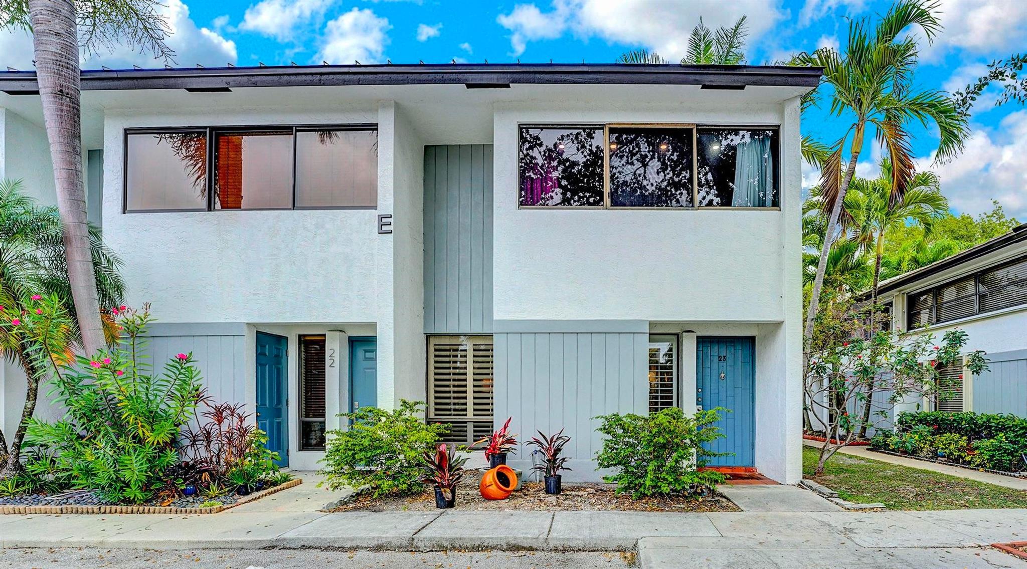 This stunning corner unit townhome is located in the beautiful, tree-lined community of Cobble East, offering the perfect blend of comfort, style, and convenience. Featuring modern finishes, stainless steel appliances, and a spacious private deck, it’s ideal for entertaining or enjoying quiet outdoor living. Upstairs offers two en-suite bedrooms and convenient in-unit laundry. Situated just one block from fine dining, shopping, LA Fitness, Planet Fitness, and the beaches. This well kept private community includes a cabana-style social area with a heated pool & jacuzzi, making it easy to enjoy the South Florida lifestyle. The HOA covers Wi-Fi, cable, the home exterior, heated community pool & Jacuzzi, front landscaping & pest control. 40-year inspection passed in 2023.