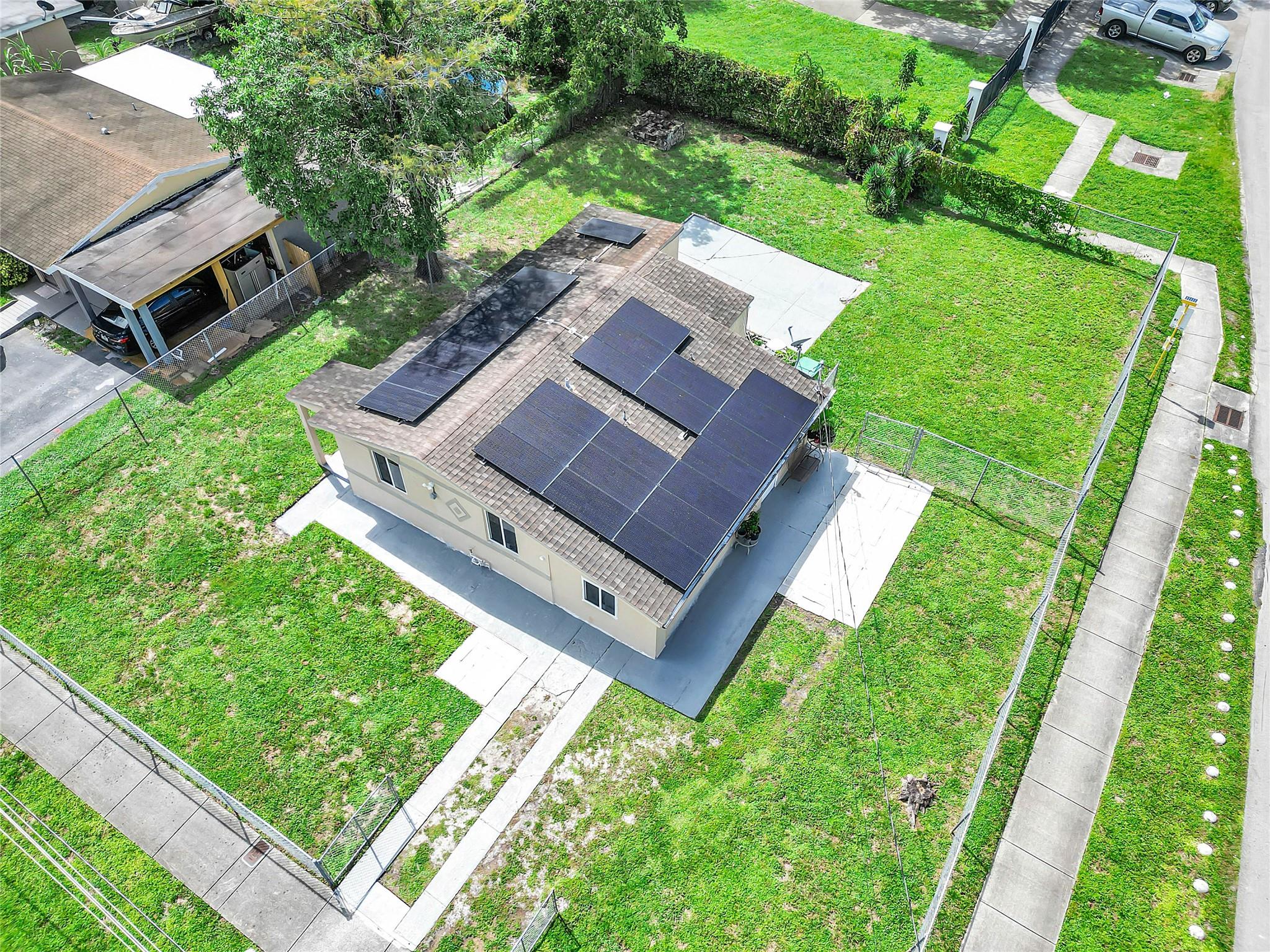 Rare Find in Lauderhill! This spacious home sits on a nearly 8,000 sq ft lot with NO HOA offering the freedom to make it your own. Features include impact windows, solar panels, a new AC system, updated electrical panel, replumbing, and renovated bathroom. The enclosed porch has been transformed into a  bonus room, adding valuable living space. This move-in ready property is minutes from Fort Lauderdale beaches, shopping, and major highways. With a private backyard big enough for a pool and endless outdoor entertaining, this home is ready for South Florida living. Don’t miss the chance to own in a growing area with strong rental demand.
