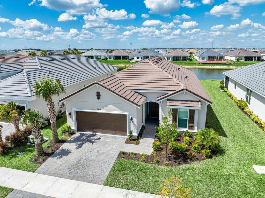 Photo of 9876 SW Santini Road, Port Saint Lucie, FL 34987 (MLS # B26007566)