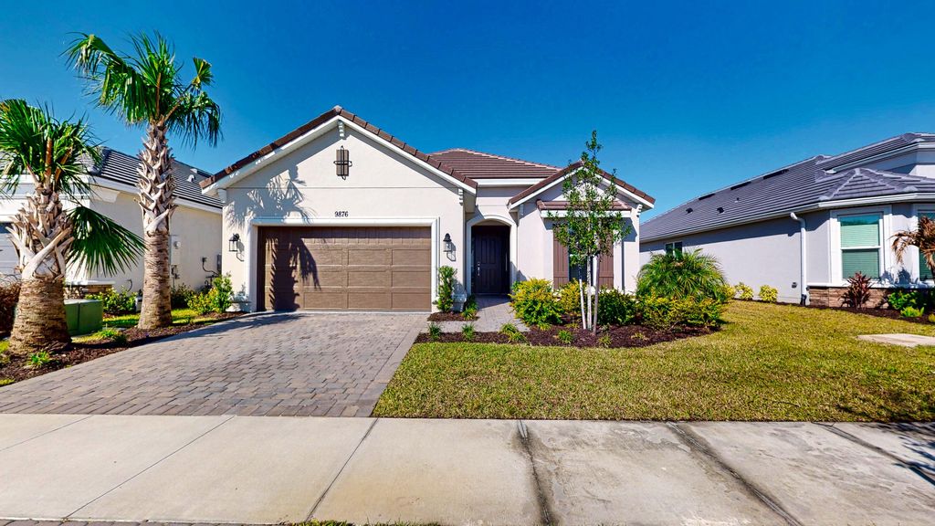 Photo of 9876 SW Santini Road, Port Saint Lucie, FL 34987 (MLS # B26007566)