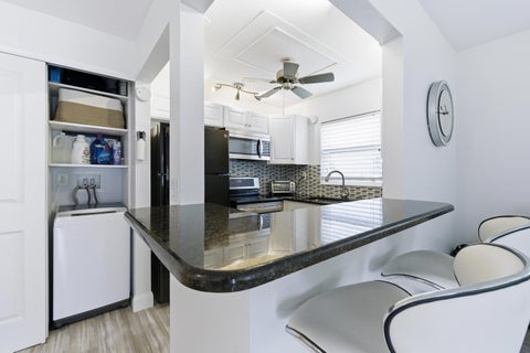 Tiny photo for 70 Bedford #C, West Palm Beach, FL 33417 (MLS # B26026862)