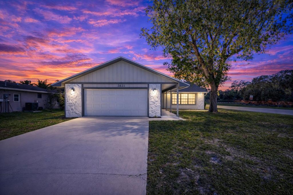 Photo of 2621 SE Westmoreland Boulevard, Port Saint Lucie, FL 34952 (MLS # B26007980)