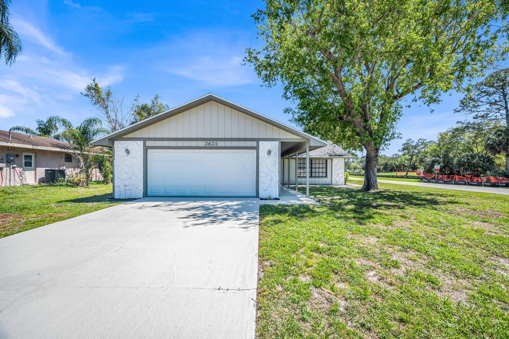 Photo of 2621 SE Westmoreland Boulevard, Port Saint Lucie, FL 34952 (MLS # B26007980)