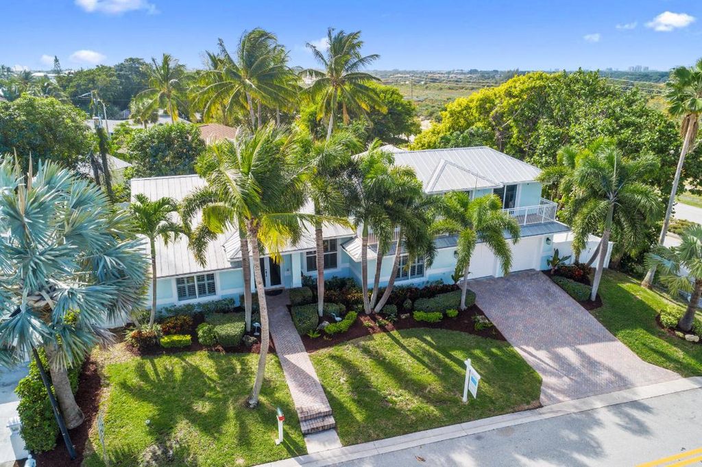 Photo of 490 Mars Way, Juno Beach, FL 33408 (MLS # R10871727)