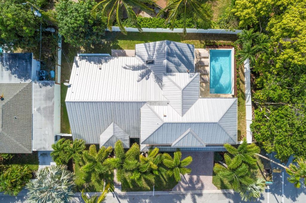 Photo of 490 Mars Way, Juno Beach, FL 33408 (MLS # R10871727)