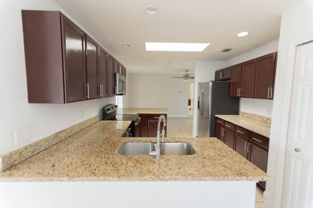 Photo of 382 NE Genesee Avenue, Port Saint Lucie, FL 34983 (MLS # R11161234)