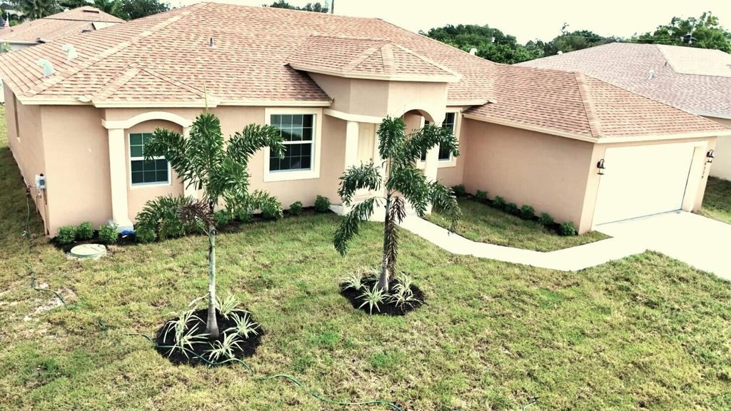 Photo of 4229 SW Bachman Street, Port St Lucie, FL 34953 (MLS # R10932742)