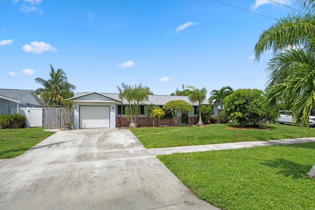 Photo of 12069 Easterly Avenue, Palm Beach Gardens, FL 33410 (MLS # B26074456)