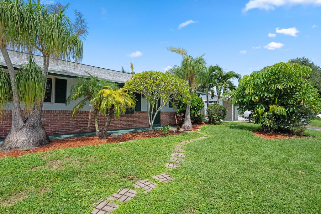 Photo of 12069 Easterly Avenue, Palm Beach Gardens, FL 33410 (MLS # B26074456)
