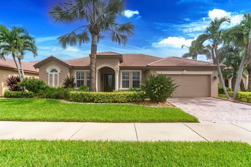 MAJOR PRICE ADJUSTMENT.  Welcome to luxury living in the Mediterranean-inspired community of The Vineyards at St. Lucie West. This elegant pool home offers stunning lake views, a spacious open layout, and a gourmet kitchen with granite counters, stainless steel appliances, and 42'' cabinets. The serene primary suite features wood floors, dual walk-in closets, and a spa-like bath. Enjoy formal and casual living areas, a private office, media nook, and a screened pool with covered patio—perfect for relaxing or entertaining. A new HVAC system, less than one year old, adds comfort and efficiency. Don't miss this rare opportunity! Beautiful home with Gorgeous Lake and Sunset Views.