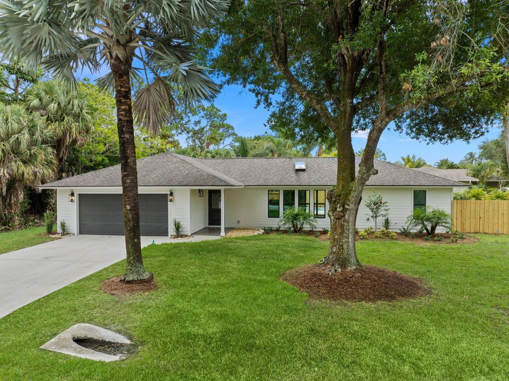 Photo of 2736 SW Bridgeway Street, Palm City, FL 34990 (MLS # R10988528)