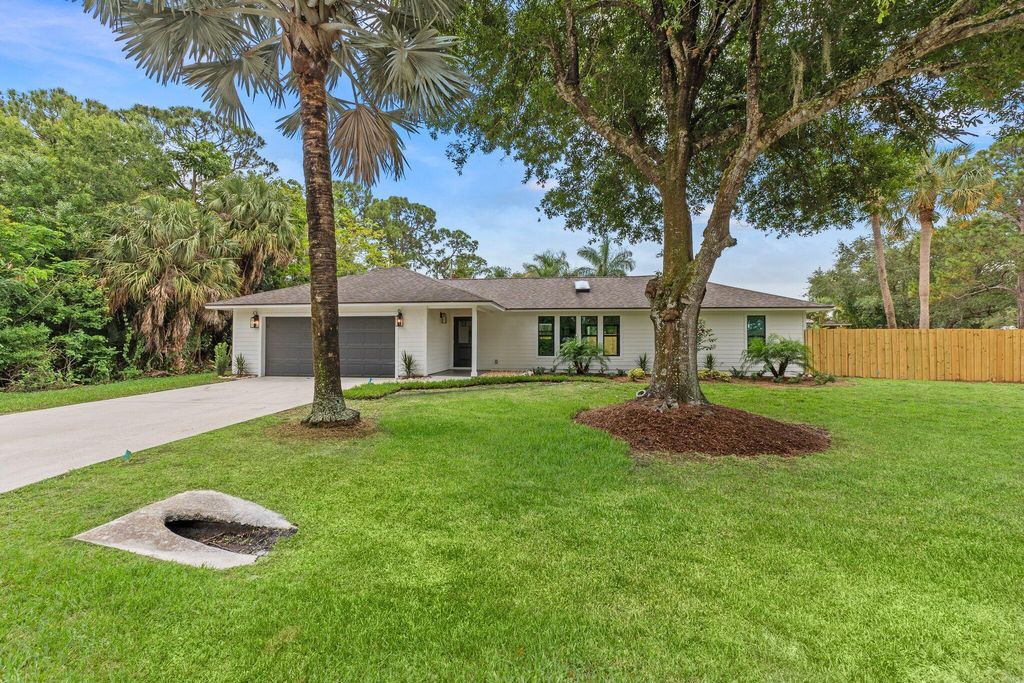 Photo of 2736 SW Bridgeway Street, Palm City, FL 34990 (MLS # R10988528)