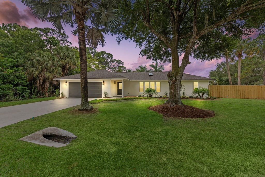 Photo of 2736 SW Bridgeway Street, Palm City, FL 34990 (MLS # R10988528)