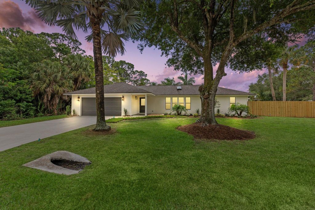 Photo of 2736 SW Bridgeway Street, Palm City, FL 34990 (MLS # R10988528)