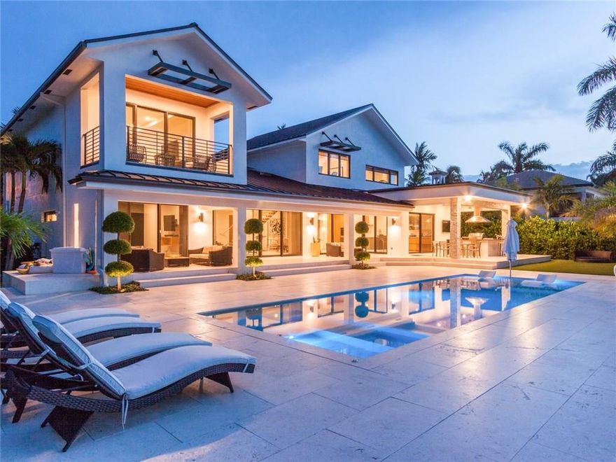 SELLERS MOTIVATED.  WILL CONSIDER ALL REASONABLE OFFERS.WATERFRONT CONTEMPORARY MODEL HOME SEVEN ISLES NEIGHBORHOOD 5 BEDROOMS+GYM/OFFICE+FAMILY ROOM+NANNY’S ROOM AND 7.5 BATHS. FULLY REMODELED 2-STORY HOME ON 13,000 SQ.FT LOT W 100' CONCRETE DOCK. GRAND ENTRYWAY W GLASS STAIRCASE, OPEN FLOOR PLAN, HIGH CEILINGS AND SLIDING DOORS GREAT FOR INDOOR/OUTDOOR LIVING. MASTER SUITE HIS/HERS WATER CLOSET, HIS/HERS WALK IN CLOSETS. ITALIAN KITCHEN WITH SUBZERO AND WOLF APPLIANCES. BACKYARD W SALTWATER POOL/ HOT TUB & SUMMER KITCHEN.FURNISHINGS OPTIONAL READY TO MOVE IN.