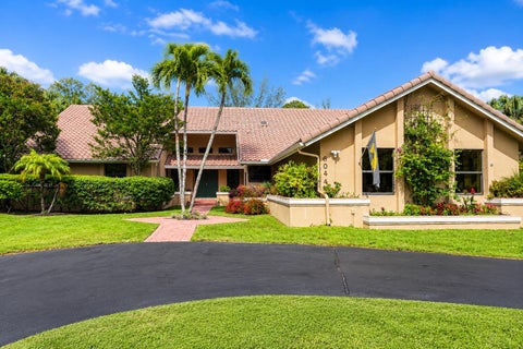 Photo of 6044 NW 66th Way, Parkland, FL 33067 (MLS # B26039584)