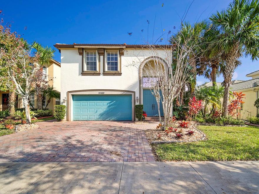 Welcome to your dream home. A beautiful retreat in Tradition's Town Park boasting exceptional design, craftsmanship and attention to detail throughout. Expansive 4 bedrooms, 3 full baths, 2,980 sq feet with an opportunity for water views from both the spacious patio and primary suite balcony. Grand Living Room and formal dining room with vaulted ceilings and open kitchen decked out with stainless steel appliances, granite countertops, a tile backsplash, 42''cabinets, breakfast bar and light & bright eat-in dining area with views through the bay windows onto the peaceful, waterfront backyard. The first level also offers a guest bedroom and cabana bath and laundry/utility with laundry sink. An elegant staircase leads up to the primary suite which is situated upstairs and consumes over half of the entire second floor. The primary suite retreat offers a large office area, tiered ceiling, dual closets, private balcony with water views, oversized shower and gracious bath. Outdoors, relax and entertain under your covered lanai with an extended awning overlooking your fenced-in backyard. Additional features include: remodeled bathrooms, accordion shutters, new gutters & flooring. Community offers; high speed internet, cable, fitness center, trash, pool, hot tub, kids play area, tennis, gym, basketball courts, billiards, and irrigation. Have the best in Florida living, minutes from restaurants, shopping with easy access to beaches, boating and more.