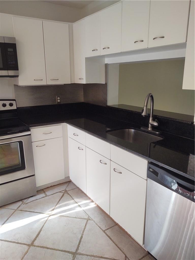 Photo of 5200 E CLUB Circle #205, Boca Raton, FL 33487 (MLS # B26079597)