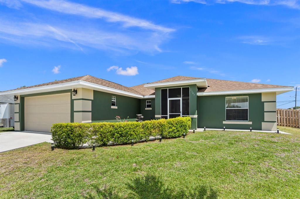 Photo of 2387 SE Manor Avenue, Port Saint Lucie, FL 34952 (MLS # R10721552)