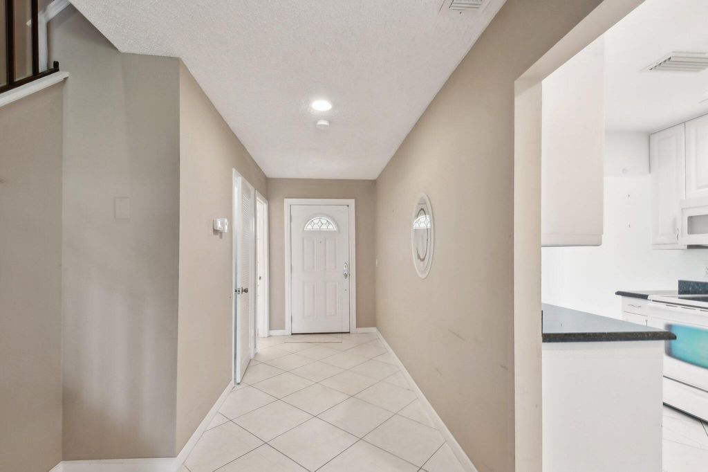 Photo of 27 Stratford Lane #C, Boynton Beach, FL 33436 (MLS # R10981911)
