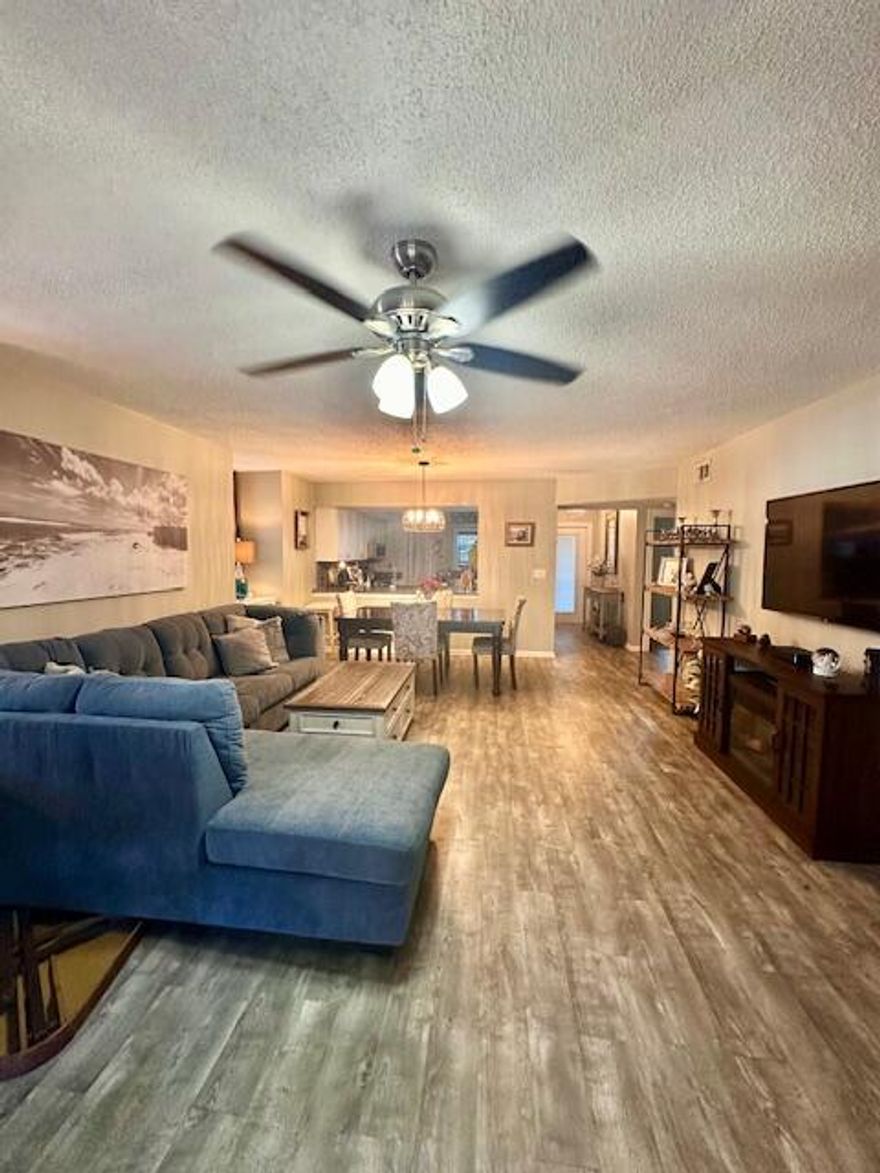 This rarely available downstairs 2-bedroom 2 bath corner condo offers the perfect blend of comfort, convenience and peace of mind. The new owner will enjoy all the benefits of the extensive HOA updates, low monthly HOA, including new roof, new pools, new carports, new sidewalks, new electrical, new paint on all buildings and more. Seller to pay assessment. Enjoy the open concept living with a spacious kitchen, generous sized bedrooms. Beautiful laminate floors. There is an enclosed porch with a storage room and a short walk to the pool. Impact windows, new fridge, ac 2018. Close to shopping, beaches, hospitals and golf. 2 pets, 25 pds. No rentals for 2 years. It is time for you to own your own piece of​​‌​​​​‌​‌​​​‌‌​​​‌‌‌​​‌​​‌‌​​​​ paradise.