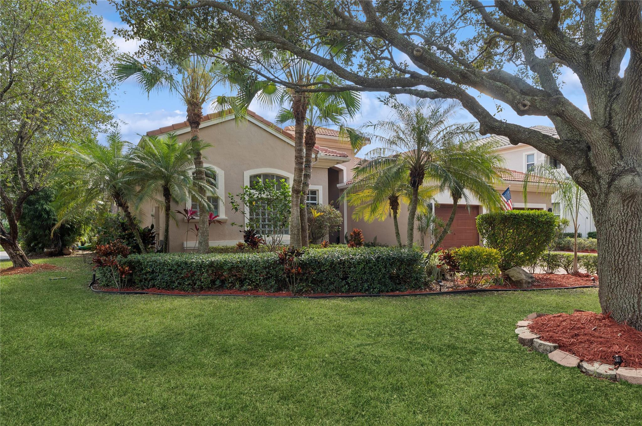 Oversized corner cul de sac 5/4 pool home (5th bedroom used as an office) located in Venetian Isle! High ceilings thoughout, beautiful wood flooring, large kitchen with island, and formal dining room. The family, living and master bedroom lead to the private pool area with tropical landscaping, and fruit trees. Very large master suite with sitting area and his and her master bathrooms.
This home has a triple split floor plan, with a bonus office desk area. Newer A/C, and appliance. Electric car charger in the garage to conveniently charge your electrical vehicles from home. Easy access to the Sawgrass expressway.
Buyer capital contribution $770.00