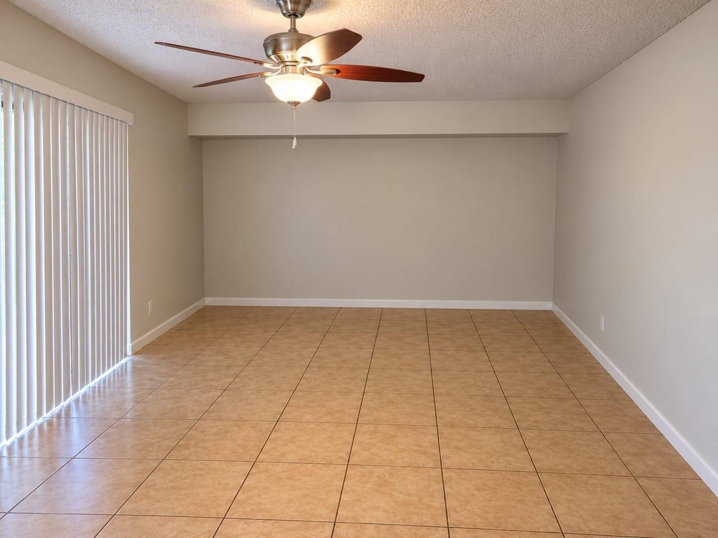 Photo of 8017 80th Way, West Palm Beach, FL 33407 (MLS # B26087089)