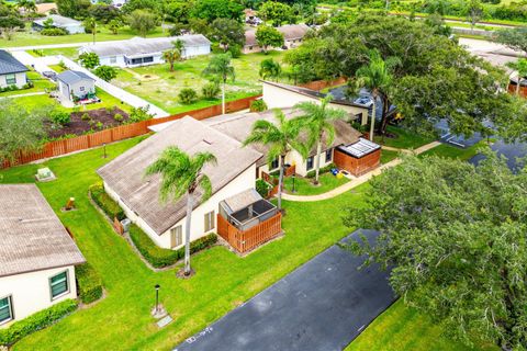 Photo of 8012 SE Villa Circle, Hobe Sound, FL 33455 (MLS # R11125781)