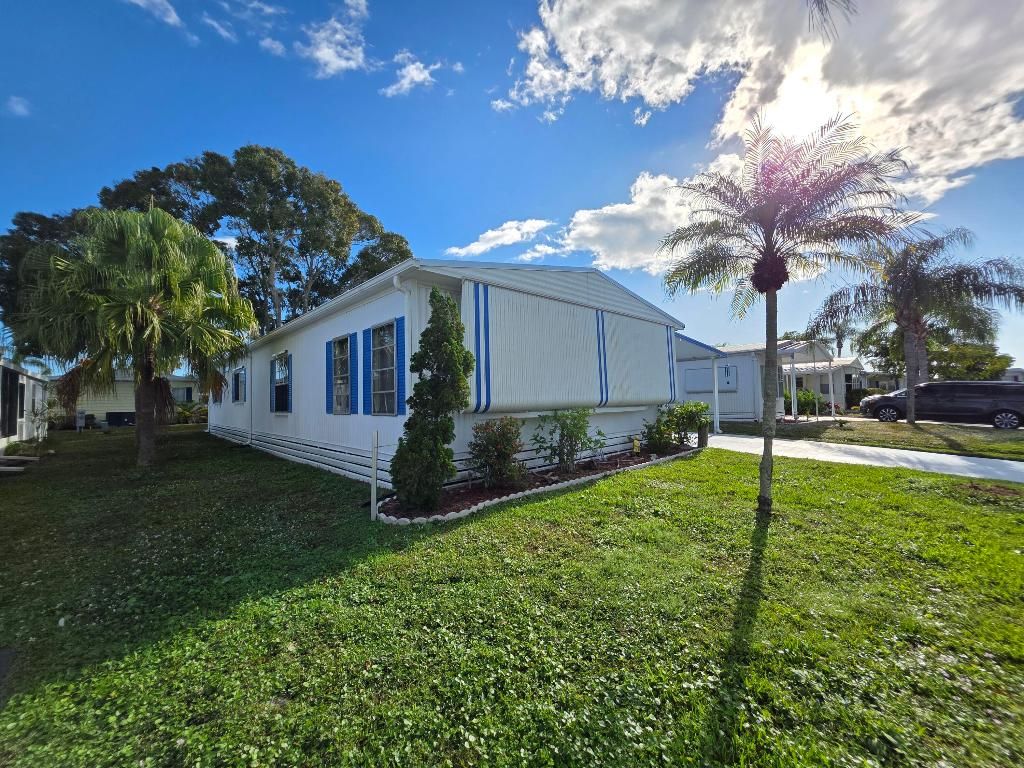 Photo of 5 Yolanda Lane, Port Saint Lucie, FL 34952 (MLS # R11146871)