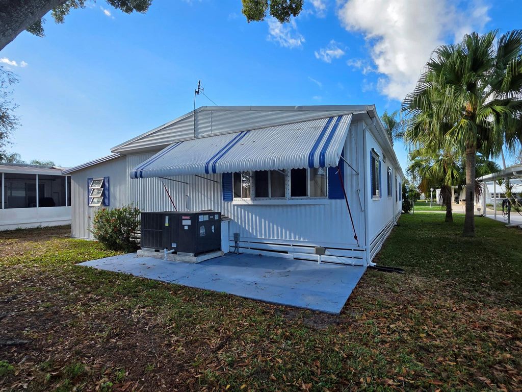 Photo of 5 Yolanda Lane, Port Saint Lucie, FL 34952 (MLS # R11146871)