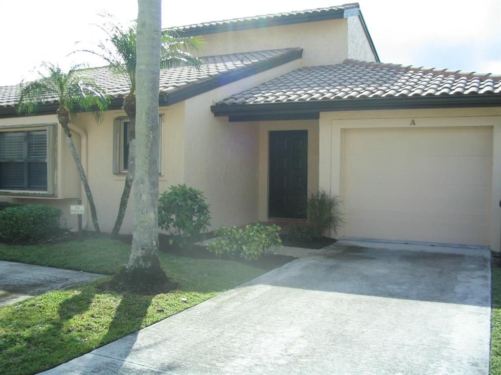 Photo of 3505 SW Quail Meadow Trail #A, Palm City, FL 34990 (MLS # R10861338)