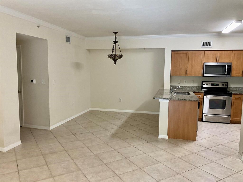 Photo of 6370 Emerald Dunes Drive #103, West Palm Beach, FL 33411 (MLS # R11133883)