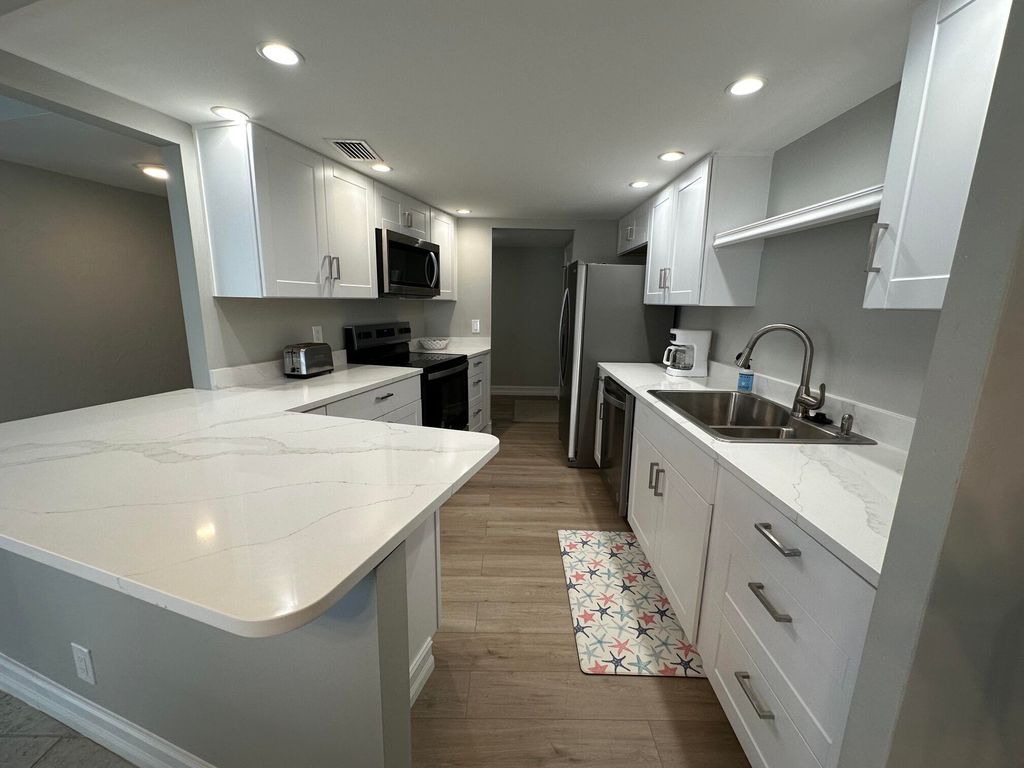 Photo of 11811 Avenue Of The Pga #3-1a, Palm Beach Gardens, FL 33418 (MLS # R11087532)