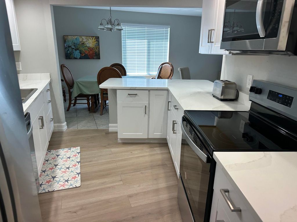 Photo of 11811 Avenue Of The Pga #3-1a, Palm Beach Gardens, FL 33418 (MLS # R11087532)