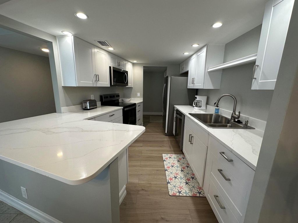 Photo of 11811 Avenue Of The Pga #3-1a, Palm Beach Gardens, FL 33418 (MLS # R11087532)