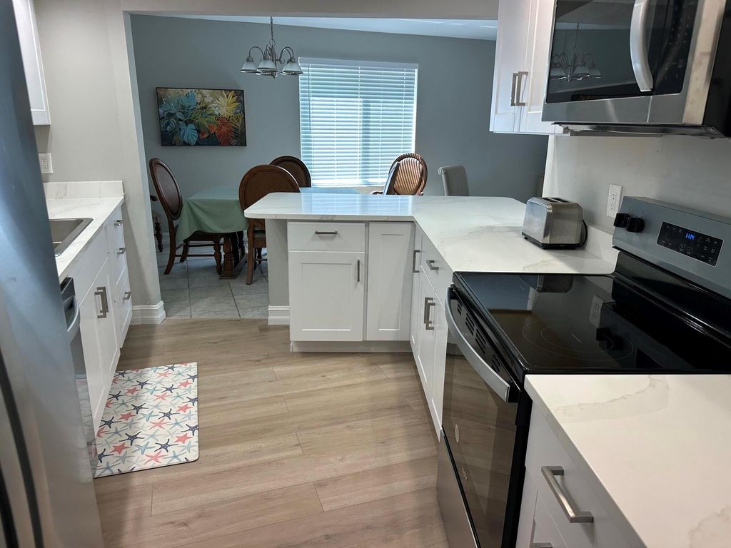 Photo of 11811 Avenue Of The Pga #3-1a, Palm Beach Gardens, FL 33418 (MLS # R11087532)