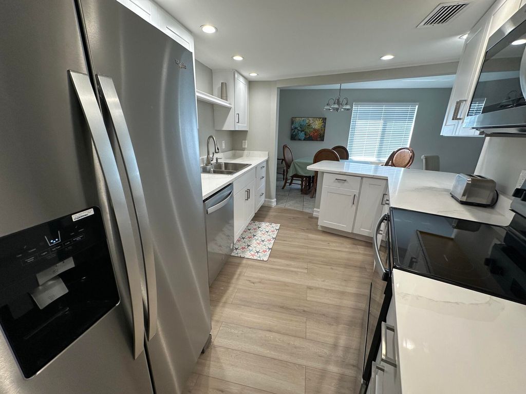 Photo of 11811 Avenue Of The Pga #3-1a, Palm Beach Gardens, FL 33418 (MLS # R11087532)