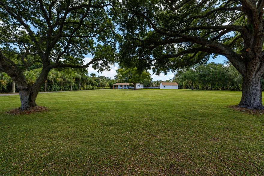 Welcome to the highly sought-after Square Lake subdivision, where space, privacy, and modern upgrades come together on an expansive nearly 2-acre lot with no HOA. This beautifully renovated Florida ranch offers the perfect blend of classic charm and contemporary living. Thoughtfully updated from top to bottom, the home features new electrical and plumbing including new PVC drain lines, new a/c and ductwork, impact windows, and luxury vinyl plank flooring throughout. The bright, open kitchen is designed for both style and function, showcasing quartz countertops, brand-new appliances, and a new water filtration system with r/o in kitchen. With 4 bedrooms and 3 full baths including a newly added primary suite with a private en-suite bathroom, the layout offers both comfort and flexibility for everyday living or hosting guests. Additional upgrades include new doors and trim molding, adding a clean, modern finish throughout the home. Step outside and enjoy the incredible potential of this oversized property. A huge detached CBS garage/workshop provides endless possibilities—ideal for storage, hobbies, or easily converted into a guest house or in-law suite. There's also ample RV/boat storage and a new asphalt driveway for added convenience. With plenty of room to add a pool, expand, or simply enjoy the wide-open space, this property offers a rare opportunity to own a move-in-ready home with room to grow in one of the area's most desirable neighborhoods.