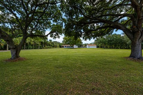 Photo of 8781 N Virginia Avenue, Palm Beach Gardens, FL 33418 (MLS # B26016673)