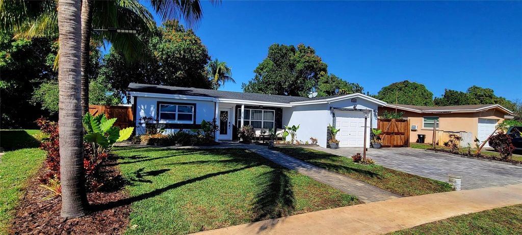 Photo of 4153 NW 47th Terrace, Lauderdale Lakes, FL 33319 (MLS # F10546392)