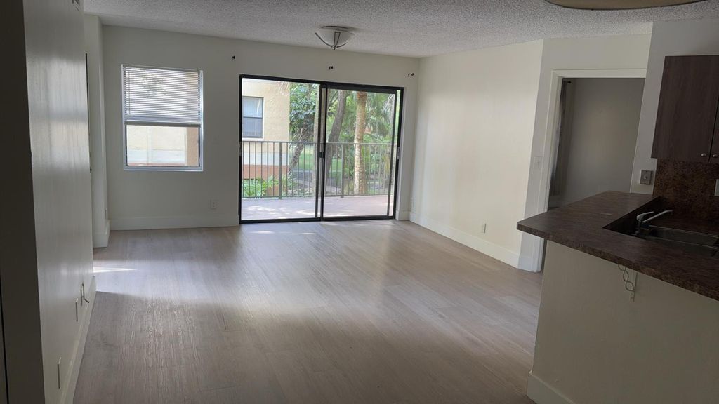 Photo of 9999 Summerbreeze Drive #917, Sunrise, FL 33322 (MLS # B26010024)