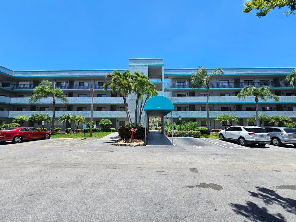 Photo of 4725 Lucerne Lakes Boulevard E #413, Lake Worth, FL 33467 (MLS # R11107301)