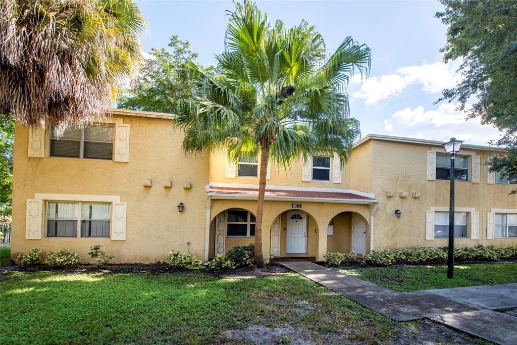 Photo of 10717 La Placida Drive #1-3, Coral Springs, FL 33065 (MLS # F10538200)