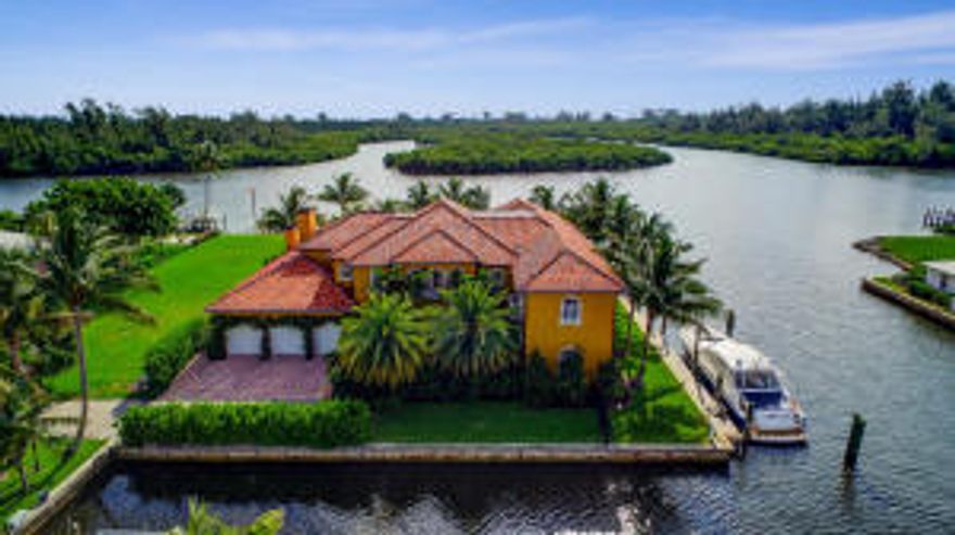 Owner/ Agent. Elegant custom built in 2012. Aprox. 7,421 sq. ft. under air. Grand foyer with self lowering chandelier. 1-60' dock on ICW with two lifts, 30 amp service & water. Also, has Deep water dock 110' long for large yacht with twin 50 amp power and water. Impact glass throughout and marble flooring from Valencia Spain.  13 ft. ceilings, gourmet chefs kitchen with separate built in Sub Zero fridge and freezer. Two dishwashers and beautiful custom cabinetry with crown moulding.  Full size butlers pant