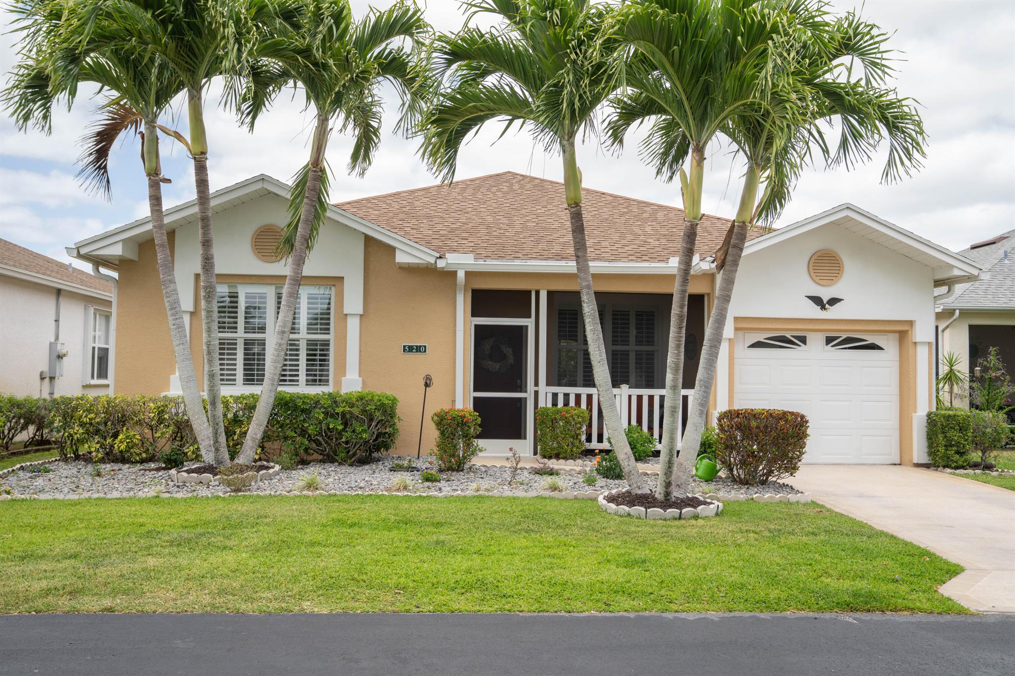 A gorgeous, well-maintained home nestled in the Isle of San Marino, of Kings Isle is ready for you! This 2 bedroom, 2 bathroom home complete with a spacious living area and separate den will make daily living a breeze. A bright, completely renovated kitchen with quartz counters and newer floors updated in 2020, plantation shutters throughout, updated bathroom shower doors and fixtures, newer exterior paint and gutters and a newer 2023 water heater are just a few of the gems in this home. Enjoy the warm Florida evenings in the comfort of the screened front and back patios. Enjoy the community's pool, clubhouse, pickleball and tennis courts, along with quiet streets for biking. Located in St. Lucie West, this active 55+ community is close to lots of shopping, entertainment and I-95.