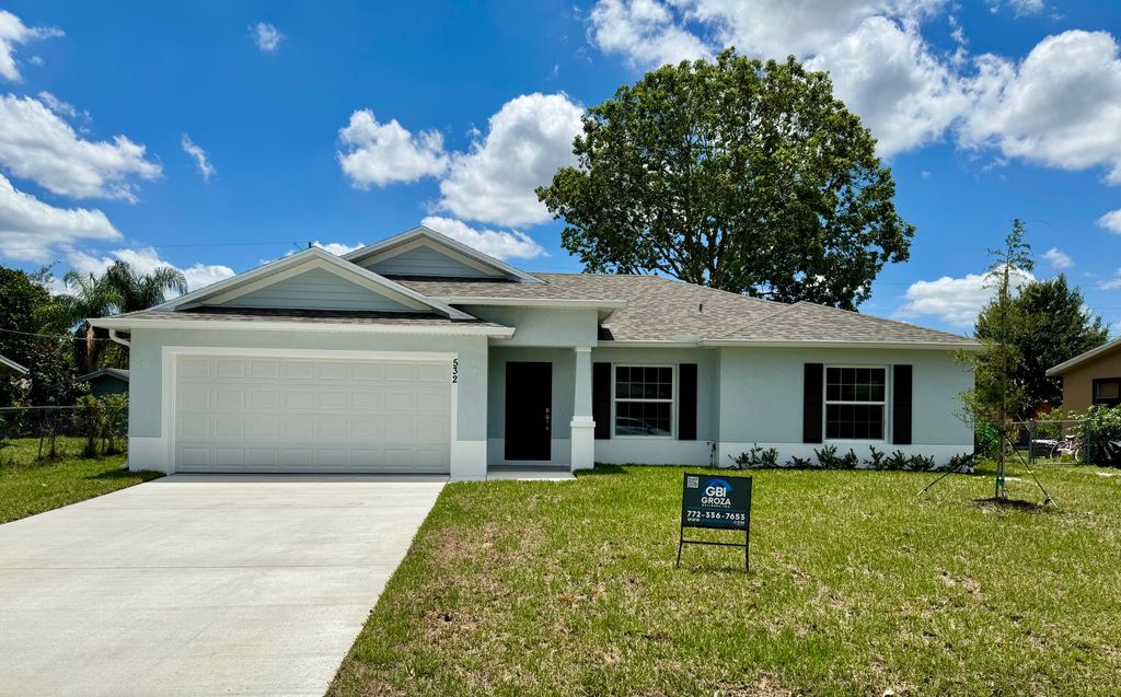 Photo of 532 SW Buswell Avenue, Port Saint Lucie, FL 34983 (MLS # B26028225)
