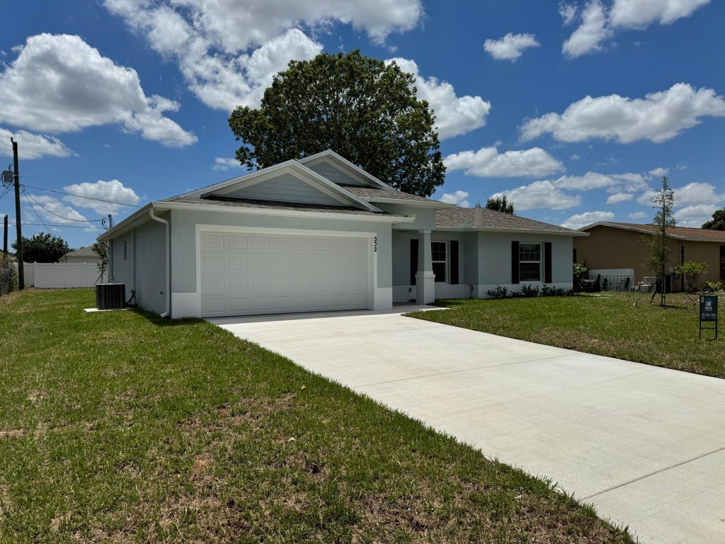 Photo of 532 SW Buswell Avenue, Port Saint Lucie, FL 34983 (MLS # B26028225)
